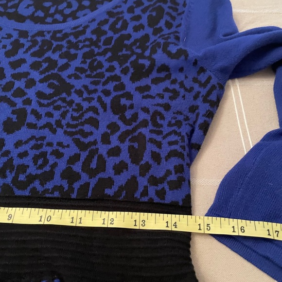 Spense Medium Midi Length knit Dress in a black and royal Blue print. - Picture 9 of 11